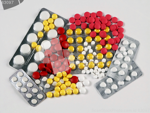 Image of Tablets multi-coloured and white in packing