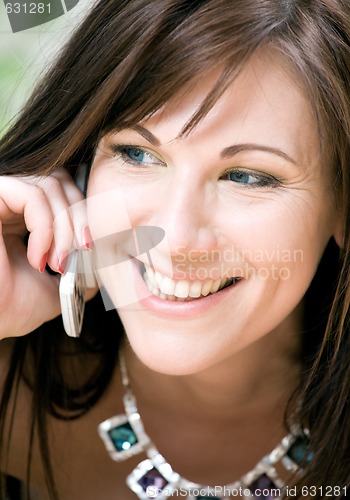 Image of woman with white phone