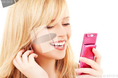 Image of happy teenage girl with cell phone