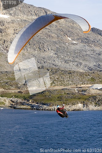 Image of Paraglider over the ocean