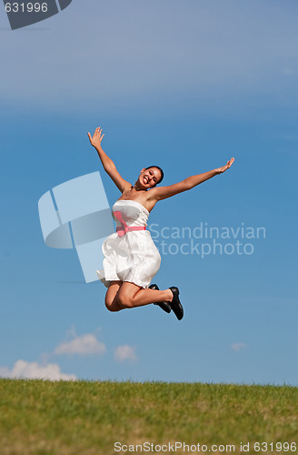 Image of Smiling Jumping Girl