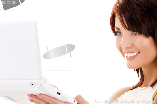 Image of happy woman with laptop computer