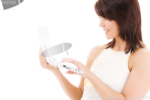 Image of happy woman with laptop computer