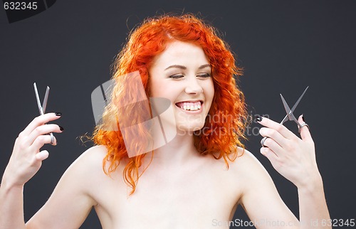 Image of redhead with scissors