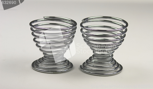 Image of two spiral metal egg cups