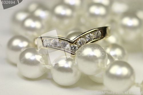 Image of engagement rings and pearls