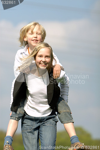 Image of brother and sister have fun together