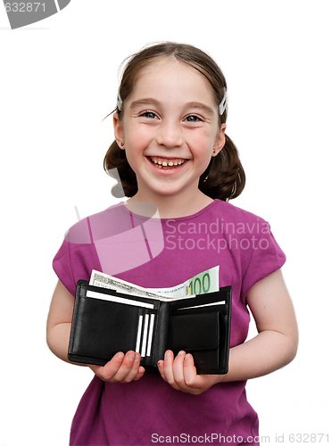 Image of Smiling seven years girl with pigtails holds a wallet with money isolated 