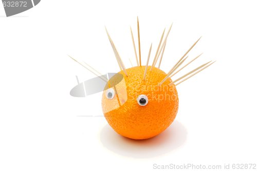 Image of Funny hedgehog made of orange fruit and toothpicks isolated