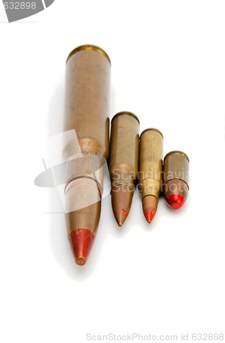 Image of Four red-tipped tracer cartridges of various calibers isolated