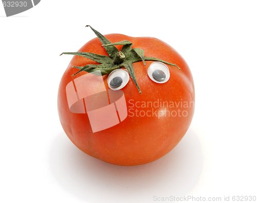Image of Funny red tomato with eyes isolated 