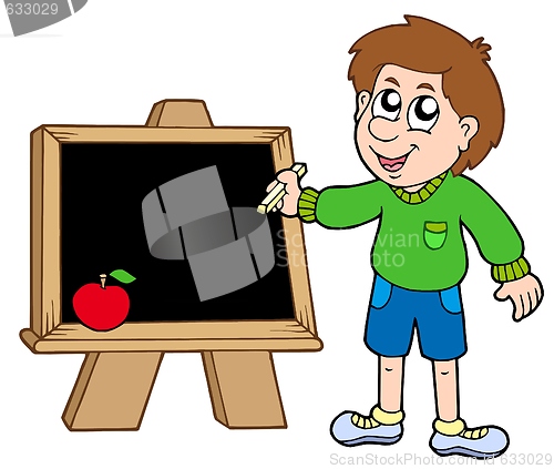 Image of School boy writing on blackboard