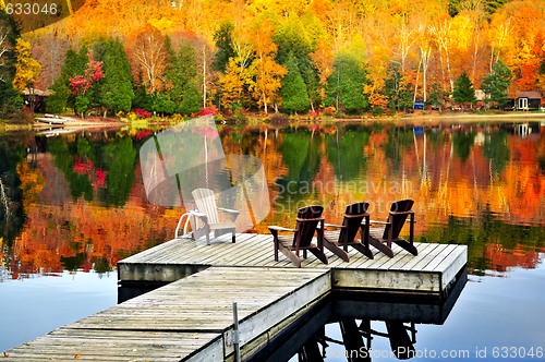 Image of Wooden dock on autumn lake