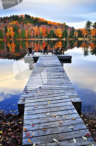 Image of Wooden dock on autumn lake