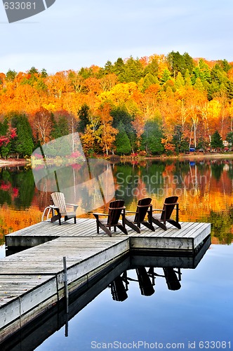 Image of Wooden dock on autumn lake