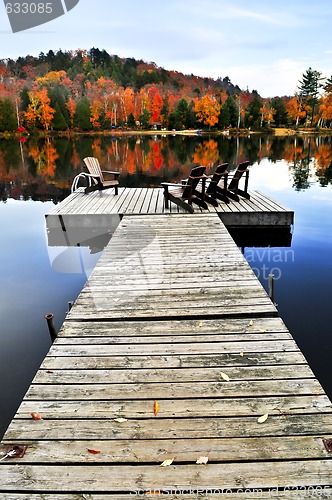 Image of Wooden dock on autumn lake