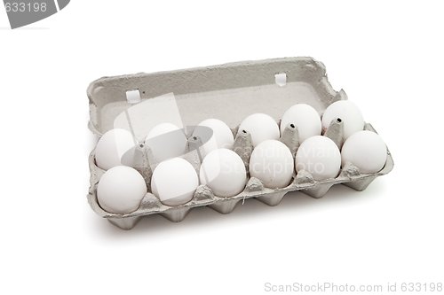 Image of Twelve eggs in a paper box isolated