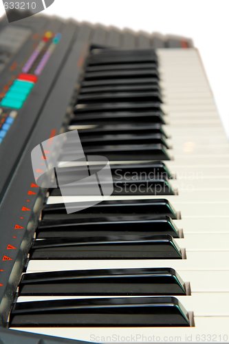 Image of Keyboard of electric piano in perspective isolated