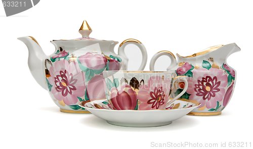 Image of Beautiful tea service with floral pattern isolated 