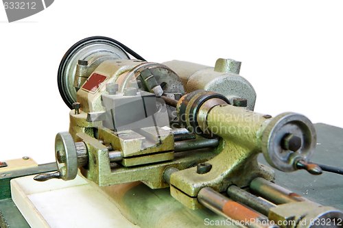 Image of Small metal lathe closeup isolated 