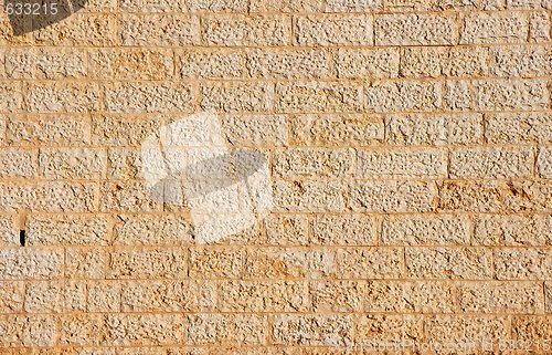 Image of Golden wall built of yellow stone blocks  texture