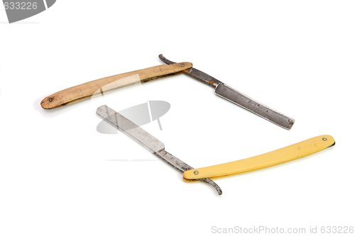 Image of Two vintage rusty razors isolated