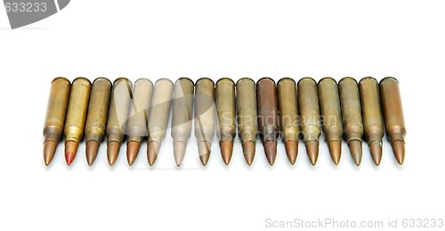 Image of Row of 5.56mm M16 assault rifle cartridges isolated