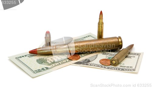 Image of American banknotes, coins and cartridges isolated