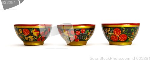 Image of Three painted Russian wooden cups isolated