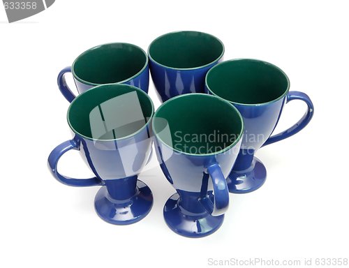 Image of Circle of five blue coffee cups with handles out isolated