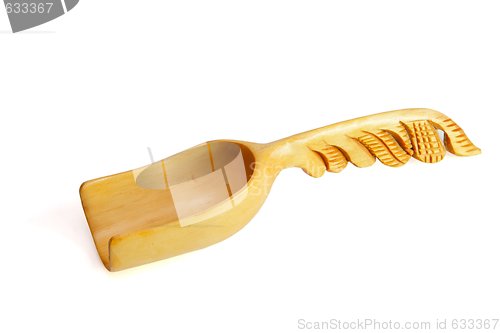 Image of Wooden scoop with carved handle isolated