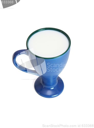 Image of High blue cup full of milk isolated