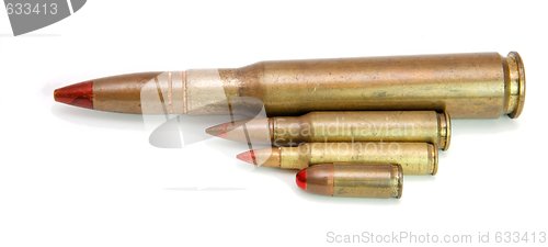 Image of Four red-tipped tracer cartridges of various calibers isolated