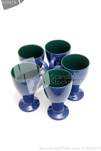 Image of Circle of five blue coffee cups isolated