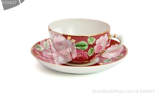 Image of Tea cup and saucer with floral pattern isolated 