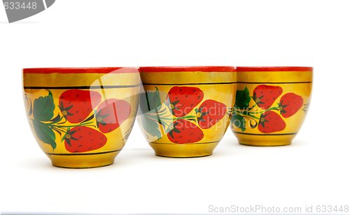 Image of Three painted Russian  wooden cups  isolated