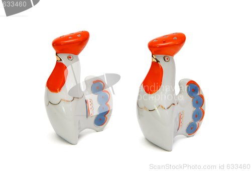 Image of Two porcelain saltsellars in shape of roosters isolated 