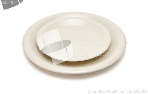 Image of Plain beige dinner plate and  saucer isolated