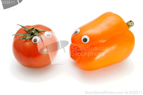 Image of Red tomato and orange bellpepper with eyes  isolated