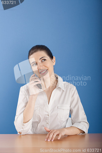 Image of Businesswoman calling at phone