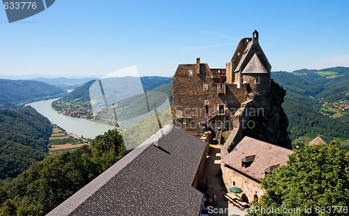 Image of Roofs and towers of medieval castle in Danube valley 