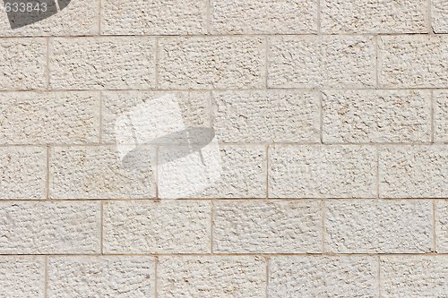 Image of Gray stone wall of rough blocks texture