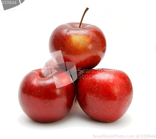Image of Four red apples in a pyramid isolated 