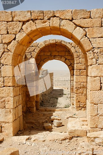 Image of Converging ancient stone arches 