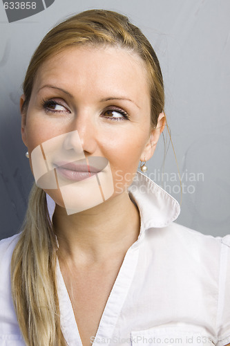 Image of beautiful woman thinking
