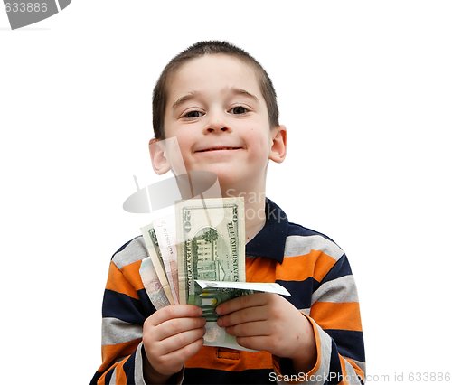 Image of Cute little boy holds a fan of banknotes isolated