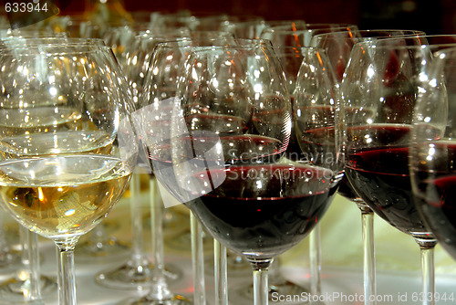 Image of champagne glasses filled with alcohol