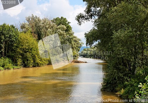 Image of Danube river channel between wooded banks in Austria