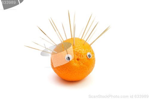 Image of Funny hedgehog made of orange fruit and toothpicks  isolated