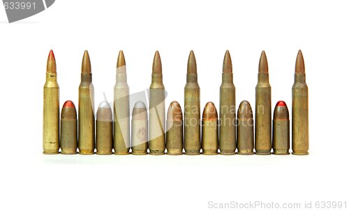 Image of Row of alternating M16 assault rifle and 9mm Parabellum cartridges isolated